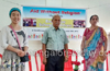Aid Without Religion Trust distributes books to Mannagudda school children